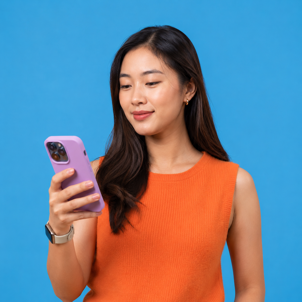 Young woman checking her smartphone and smartwatch – digital health tracking with Camtech Health